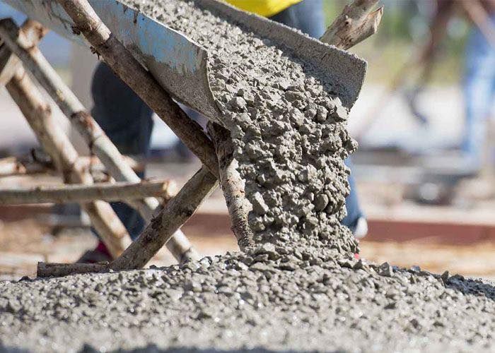 Construction materials being poured on site
